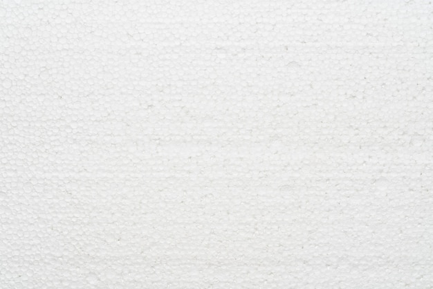 Weiße abstrakte Polystyrolschaum Textur Hintergrund Nahaufnahme Detailansicht von Styropor-Kunststoff-Platte Po...