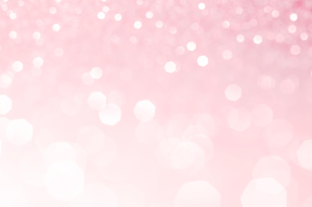 Weiße Bokeh-Lichter auf rosa Hintergrund
