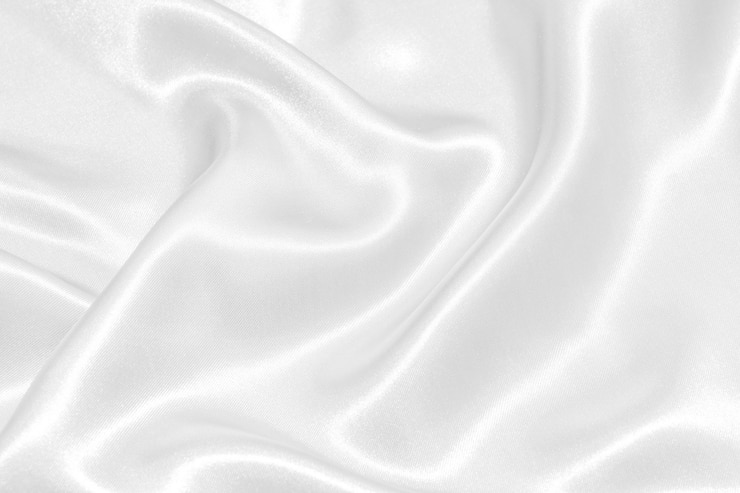Weiße gewellte silk Hintergrundbeschaffenheit