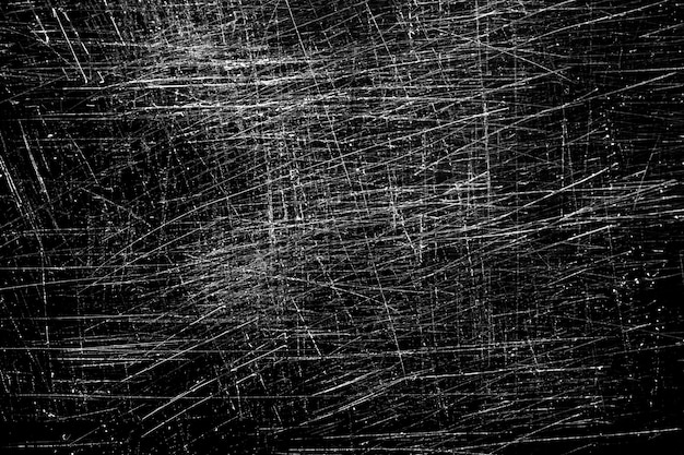 Weiße Kratzer auf schwarzem Hintergrund. chaotisches zerkratztes Glas. Foto in hoher Qualität
