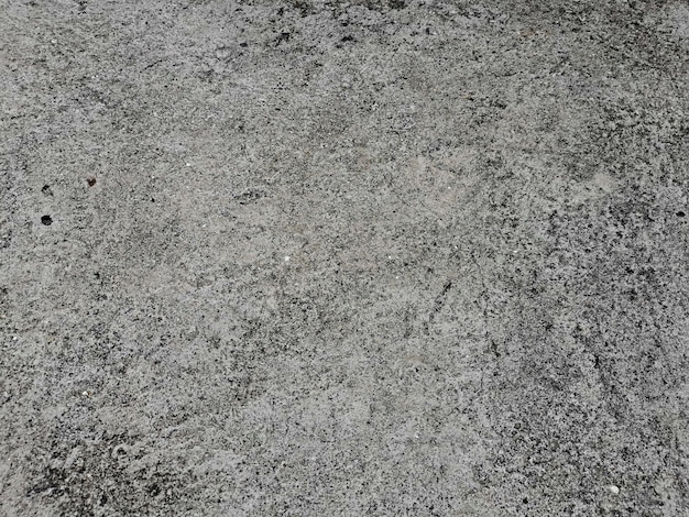 Weiße schmutzige alte Zementbeschaffenheit des konkreten Bodens