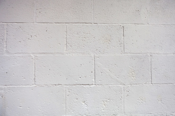 Foto weiße wand mit zementziegelsteinoberfläche