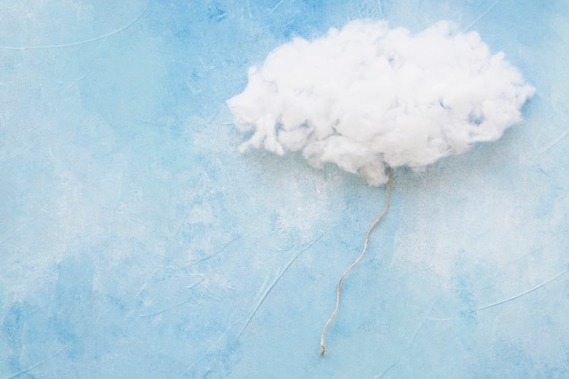 Foto weiße wolke mit schnur auf blau gemasert
