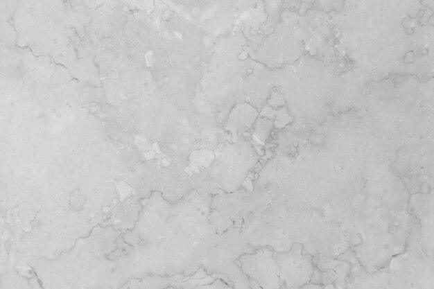 Weißer Beschaffenheitshintergrund, abstrakte Schmutzflächentapete der Steinwand, Zement.