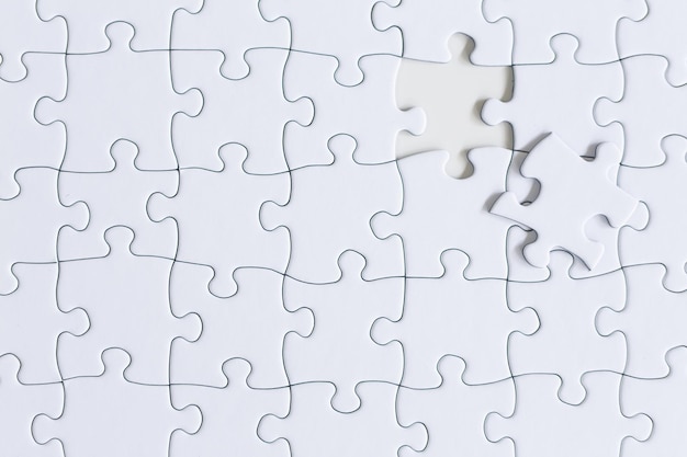 Weißer Puzzle-Hintergrund perfekt für eine Tapete