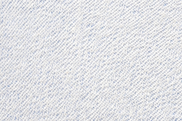 Weißer Strickjackenstoff knited Baumwollstrukturierter Hintergrund