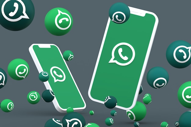 WhatsApp-Symbol auf dem Bildschirm Smartphone oder Handy und WhatsApp-Reaktionen