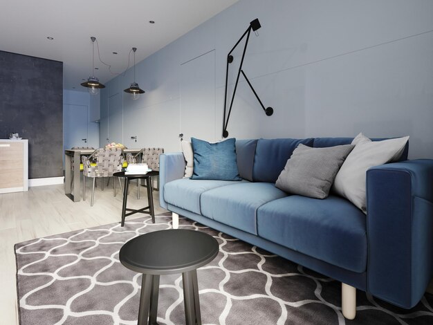 Wohnzimmer im nordischen Design mit einem modernen blauen Sofa und schwarzen Beistelltischen mit Dekor