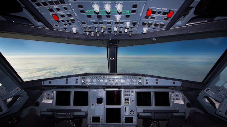 Foto wolkenlandschaft durch die windschutzscheibe eines flugzeugs