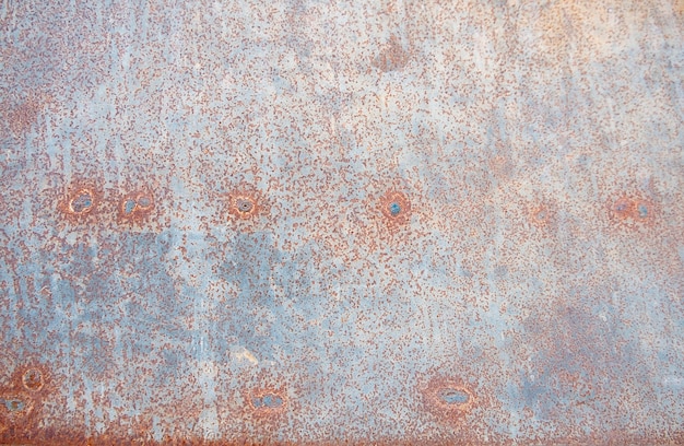 Óxido en la superficie del hierro viejo, antiguo fondo de placa de chapa metálica