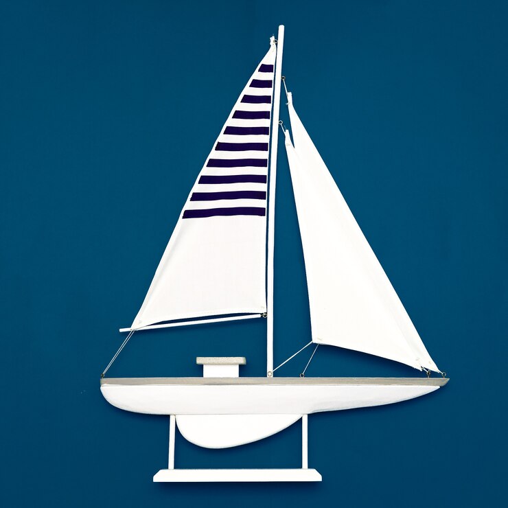 Foto yate blanco sobre fondo azul. arte minimalista