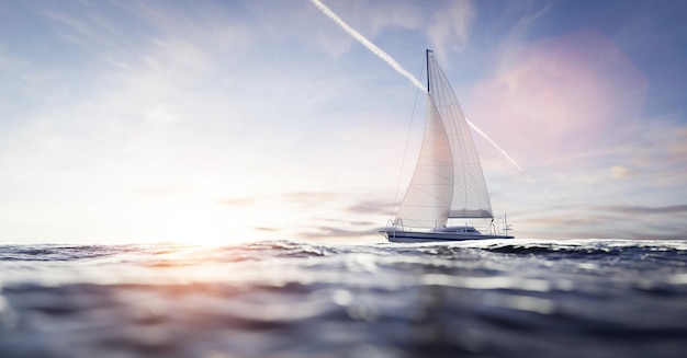 Yate de vela en el océano al atardecer