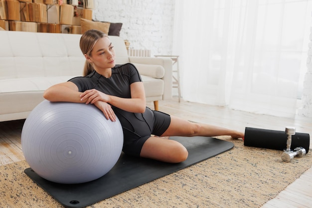 young girl doing home fitness home workouts