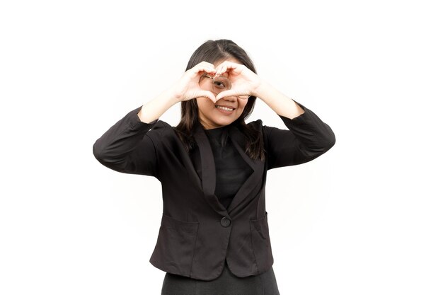 Zeigt Liebeszeichen der schönen asiatischen Frau mit schwarzem Blazer, Isolated On White Background