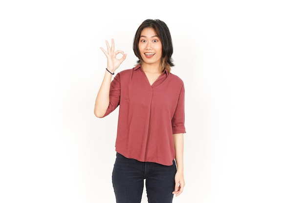 Zeigt OK-Zeichen der schönen asiatischen Frau, Isolated On White Background