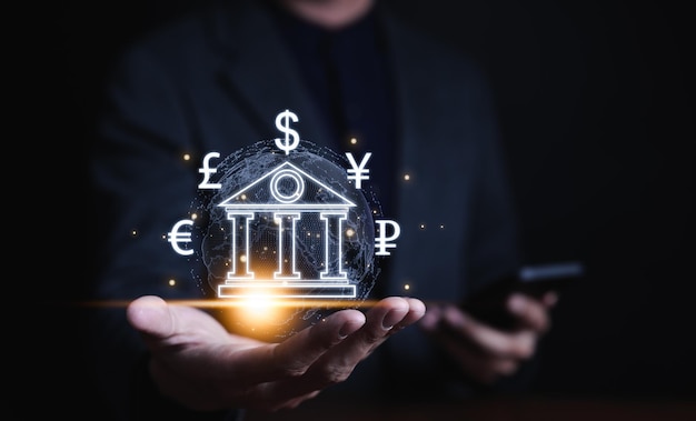 Zentralbank Online-Interbankzahlung Globales Währungswechselkonzept Geschäftsmann hält virtuelle Welt Dollar Yuan Yen Euro Rubel und Pfund Sterling Zeichen Weltwirtschaft Geschäfts Geldübertragung