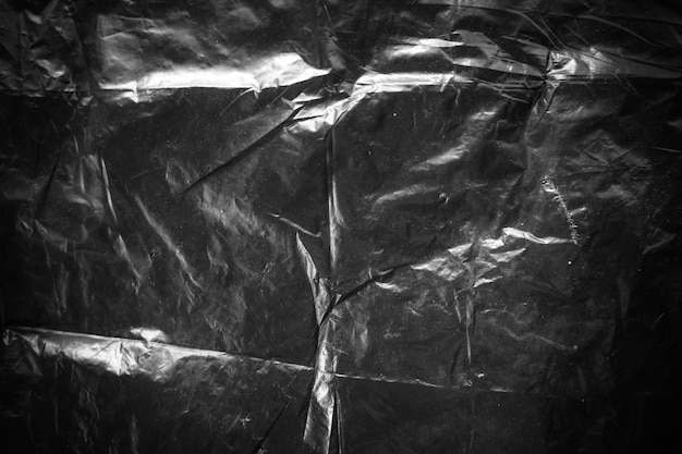 Foto zerknitterte schwarze plastikfolie