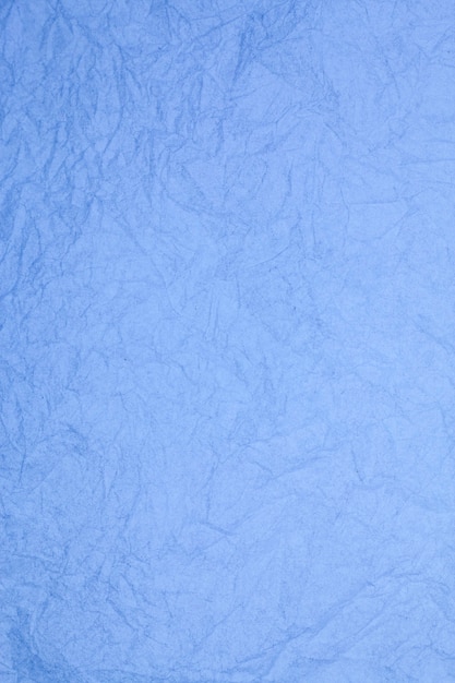Zerknittertes Vintage-blaues Papier strukturierten veralteten Hintergrund.