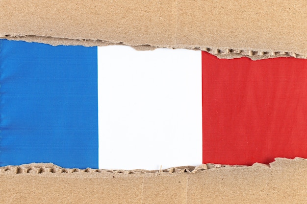 Zerrissenes Papier mit Nationalflagge von Frankreich Reisekonzept mit französischer Flagge.