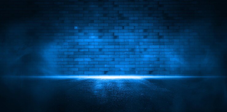 Foto ziegelblaue neonwand und asphalt leere szene