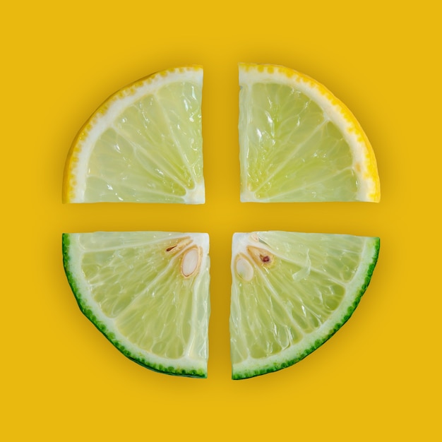 Zitronen- und Limettenscheibe und frische Zitrusfrüchte