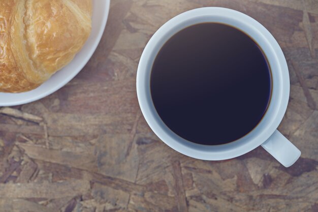 zurück Kaffee auf Holz Hintergrund.