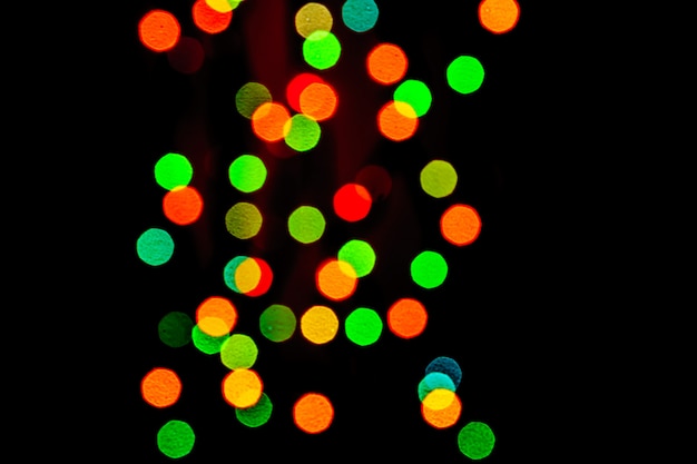 Zusammenfassung unscharfe Lichter auf Hintergrund in den roten, grünen, orange Farben.