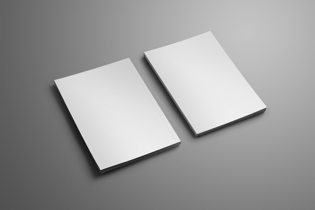 Zwei elegante, leere, geschlossene A4, (A5) Broschüren mit weichen realistischen Schatten isoliert auf grauer Oberfläche.
