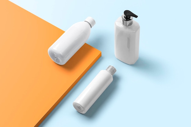 zwei Flaschen weißer Flüssigkeit sitzen auf einem Tisch mit einem Spray