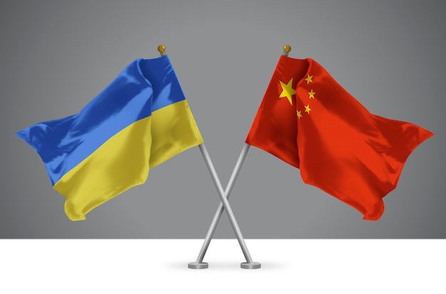 Zwei gekreuzte Flaggen von China und der Ukraine