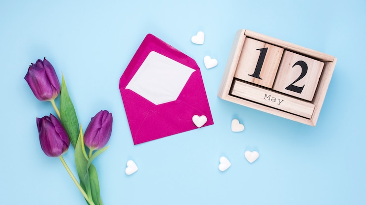 Free Photo 12 may inscription with envelope and tulips