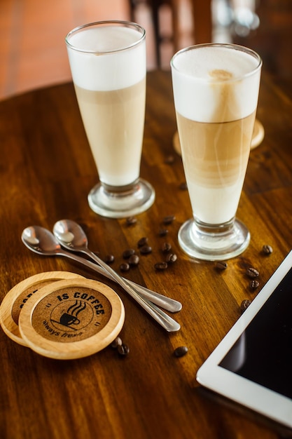 2 latte on a wooden table