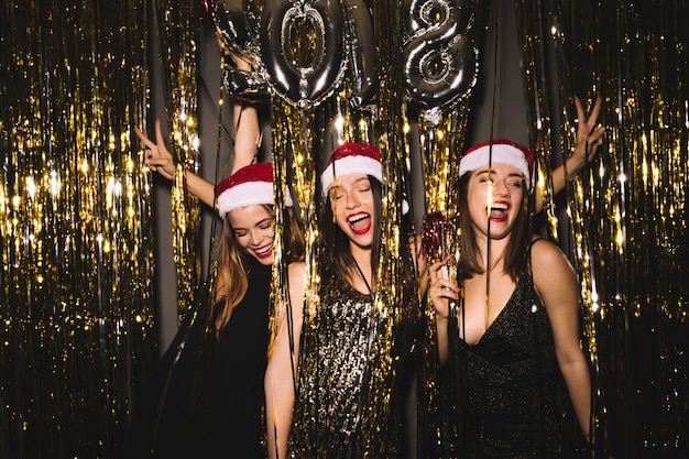 2018 new year party with three girls celebrating