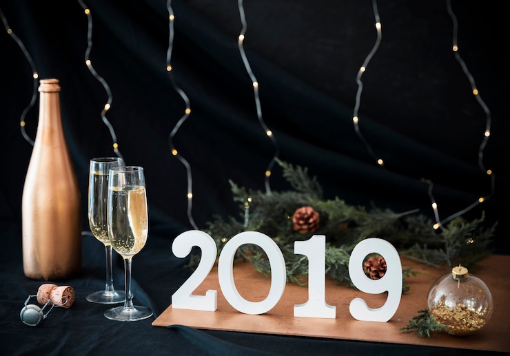 Free Photo 2019 inscription with glasses on table