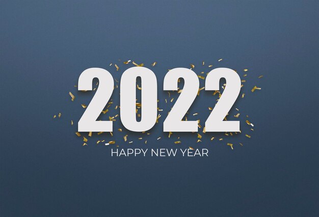 2022 white sign over yellow confetti on a blue background