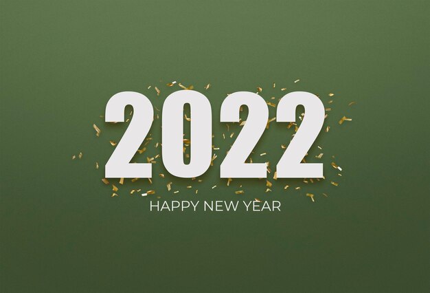 2022 белый знак над желтым конфетти на зеленом фоне