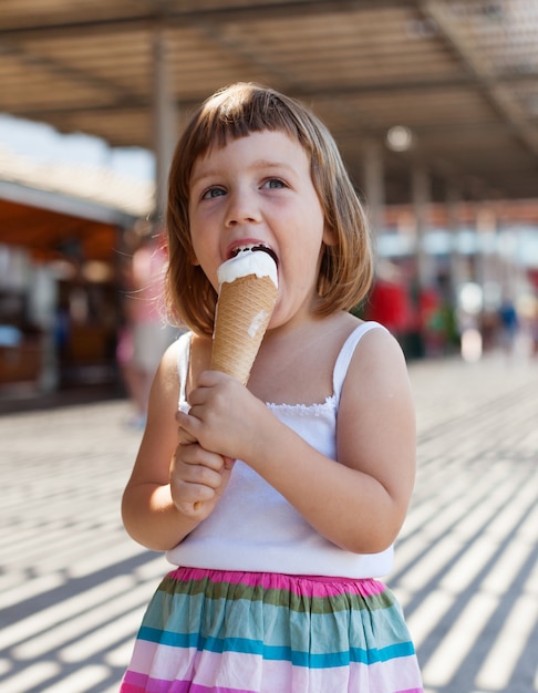 3 years child  eating ice cream