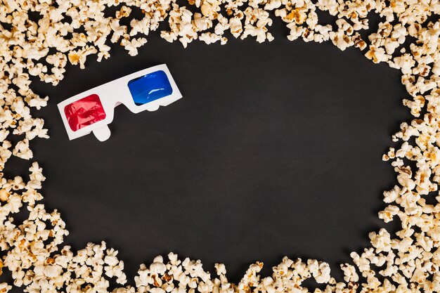 Free photo 3d glasses in popcorn frame