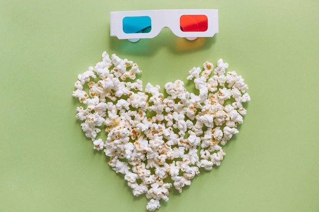 Free photo 3d glasses above popcorn