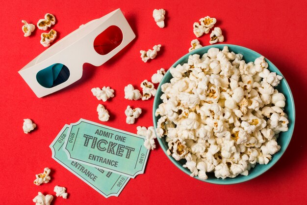 3d glasses with cinema tickets and popcorn
