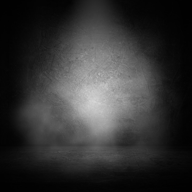 3D grunge interior with smoke in spotlight