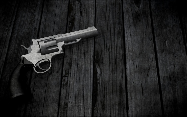 Free Photo 3d handgun on a grunge wooden texture