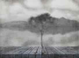 Foto gratuita il rendering 3d di un'immagine del grunge con tavolo in legno affacciata ad un albero nel fiume tranquillo