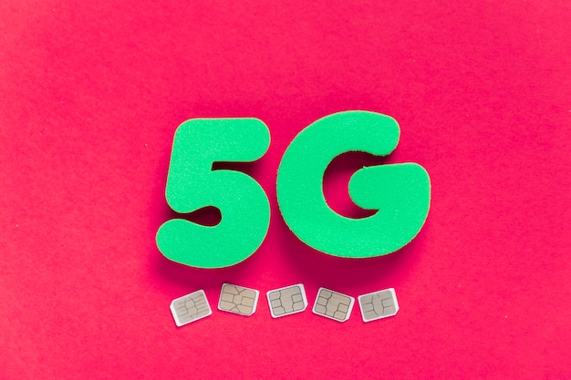 5g on plain background with sim cards under