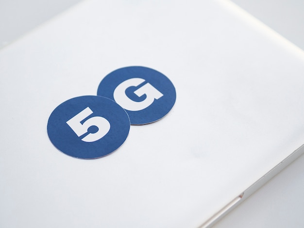 Free photo 5g stickers on top of laptop