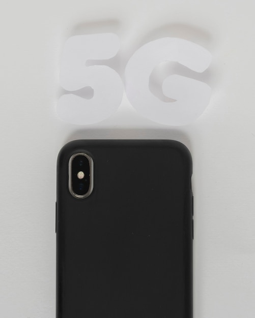 무료 사진 휴대 전화 위의 5g 텍스트