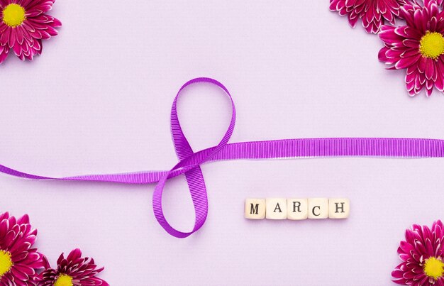 8th of march ribbon symbol and flowers