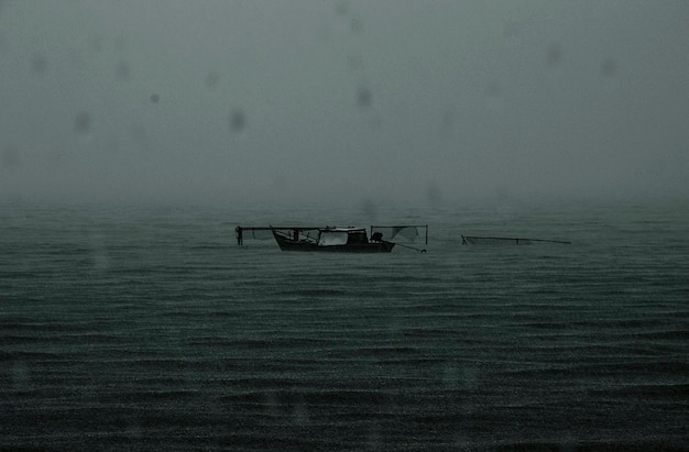 Abandoned Boat Rainy Dark Sea