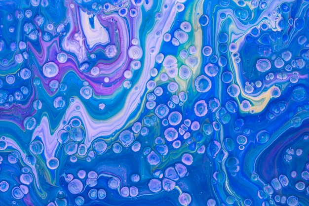 Free photo abstract acrylic effect of blue bubbles