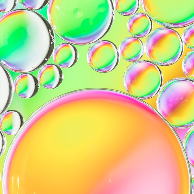 Abstract air bubbles in water on multicolored background